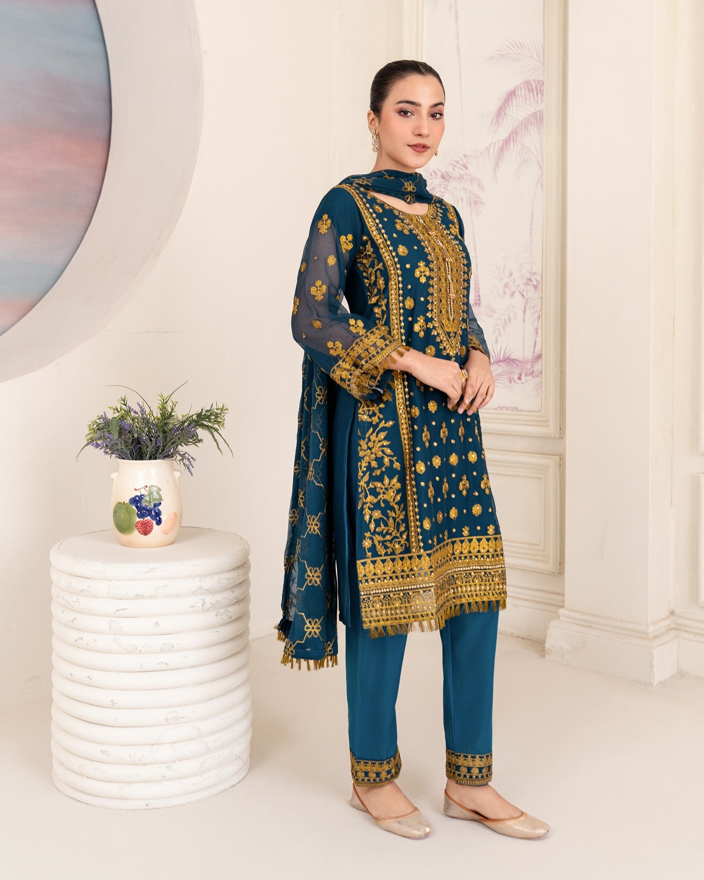 Elegant Pakistani formal outfit featuring a full embroidered chiffon shirt and dupatta with intricate zardozi work, paired with embroidered Malai fabric trousers. Available in small, medium, and large sizes from Riwaj Fashions.