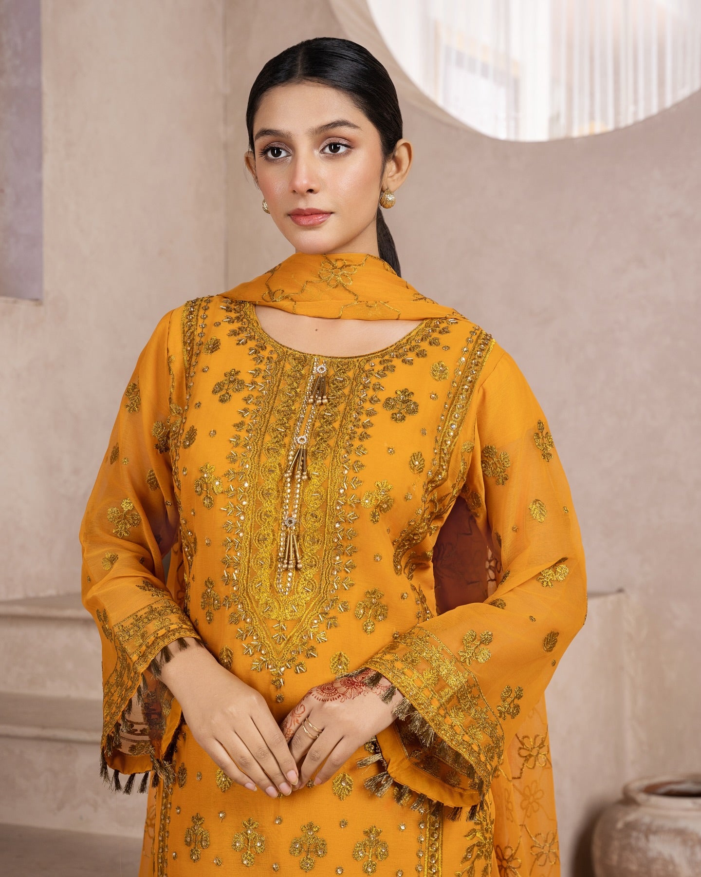 Elegant Pakistani formal outfit featuring a full embroidered chiffon shirt and dupatta with intricate zardozi work, paired with embroidered Malai fabric trousers. Available in small, medium, and large sizes from Riwaj Fashions.