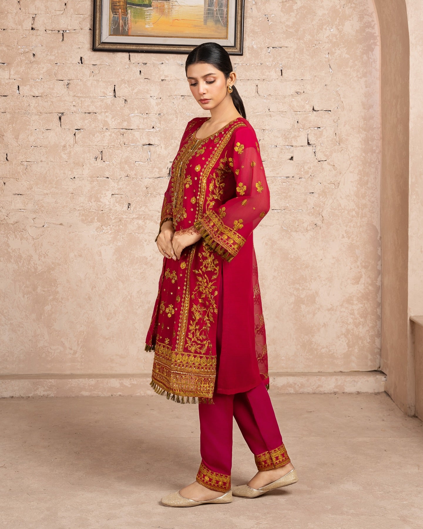Elegant Pakistani formal outfit featuring a full embroidered chiffon shirt and dupatta with intricate zardozi work, paired with embroidered Malai fabric trousers. Available in small, medium, and large sizes from Riwaj Fashions.