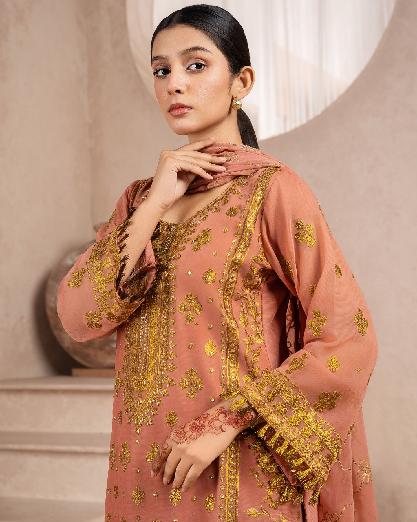 Elegant Pakistani formal outfit featuring a full embroidered chiffon shirt and dupatta with intricate zardozi work, paired with embroidered Malai fabric trousers. Available in small, medium, and large sizes from Riwaj Fashions.