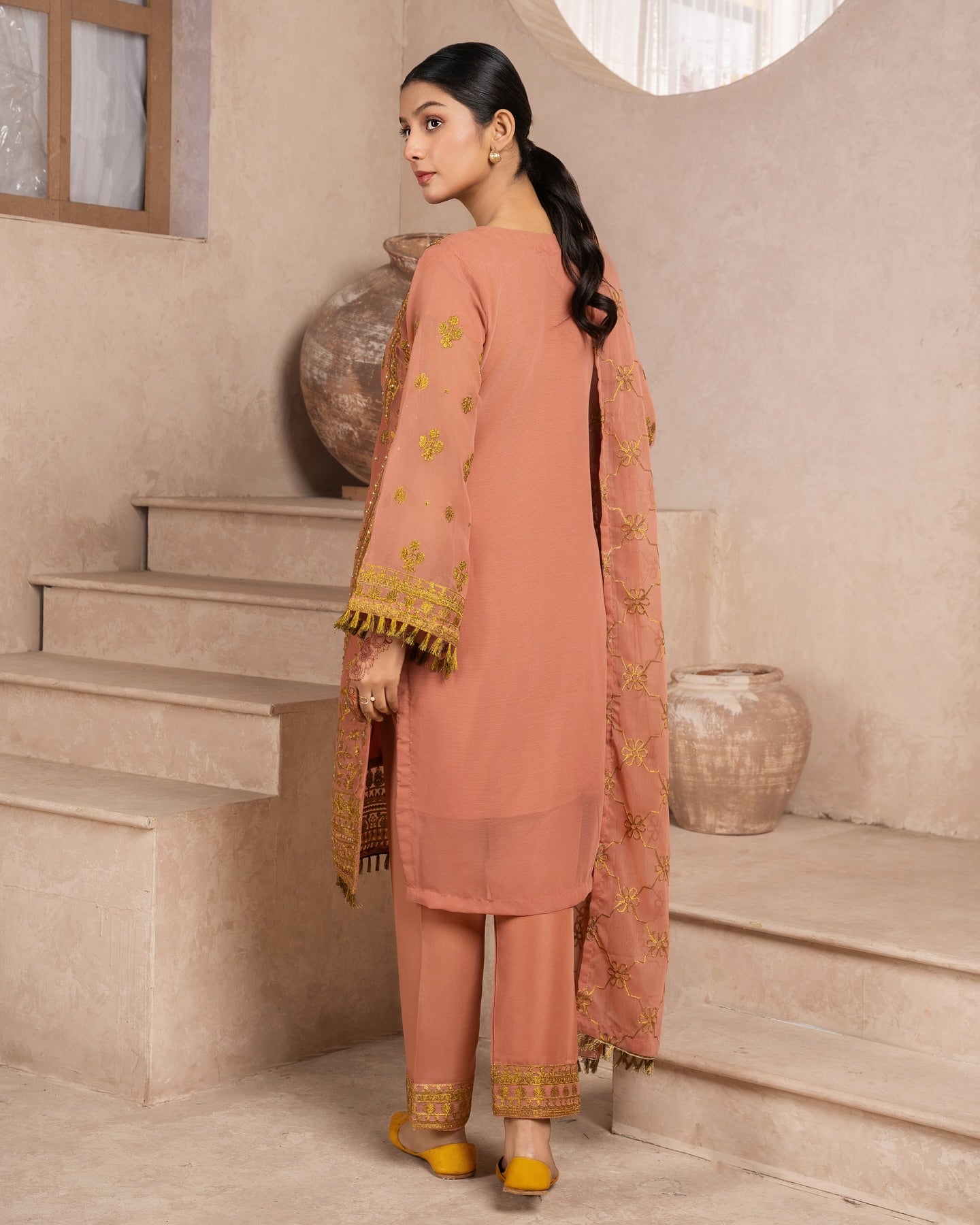 Elegant Pakistani formal outfit featuring a full embroidered chiffon shirt and dupatta with intricate zardozi work, paired with embroidered Malai fabric trousers. Available in small, medium, and large sizes from Riwaj Fashions.