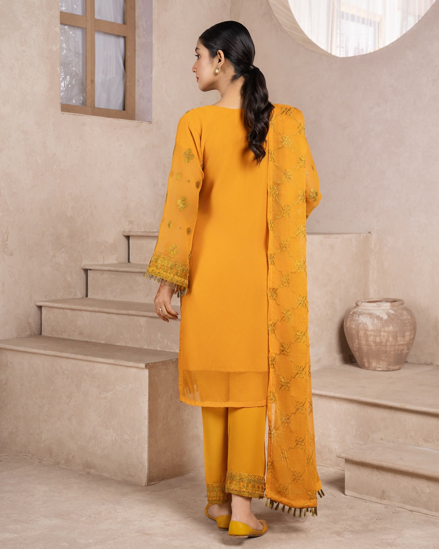 Elegant Pakistani formal outfit featuring a full embroidered chiffon shirt and dupatta with intricate zardozi work, paired with embroidered Malai fabric trousers. Available in small, medium, and large sizes from Riwaj Fashions.