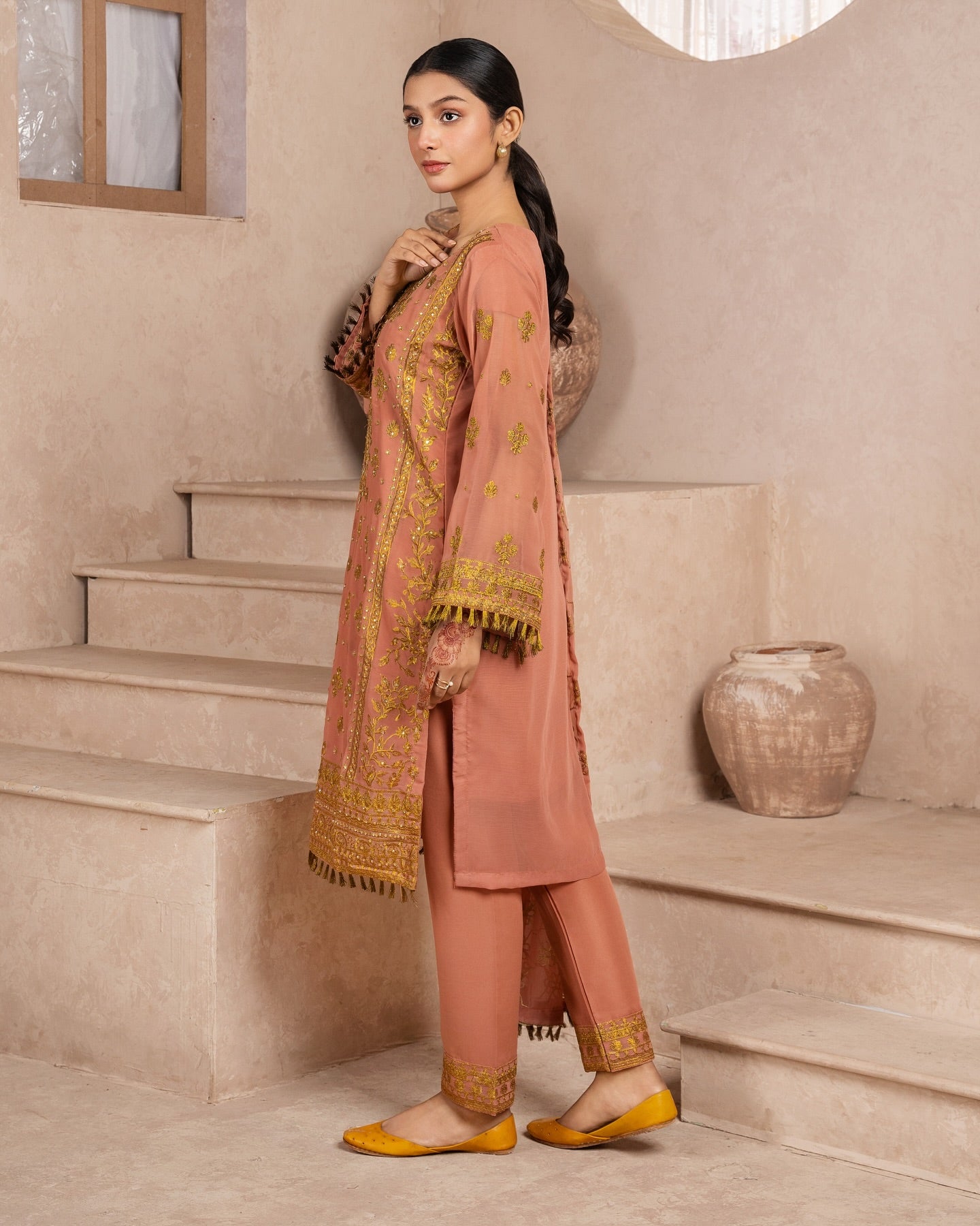 Elegant Pakistani formal outfit featuring a full embroidered chiffon shirt and dupatta with intricate zardozi work, paired with embroidered Malai fabric trousers. Available in small, medium, and large sizes from Riwaj Fashions.