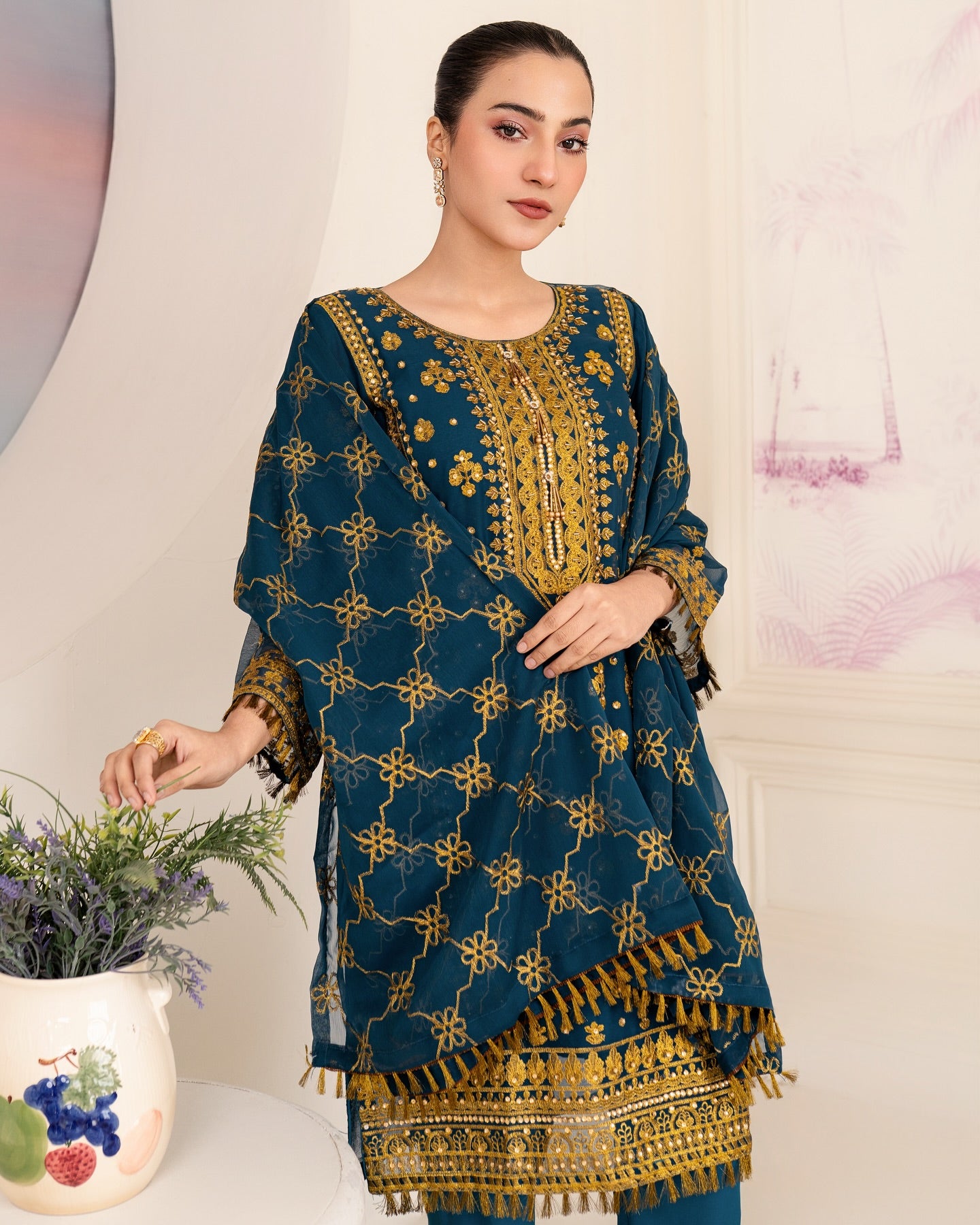 Elegant Pakistani formal outfit featuring a full embroidered chiffon shirt and dupatta with intricate zardozi work, paired with embroidered Malai fabric trousers. Available in small, medium, and large sizes from Riwaj Fashions.