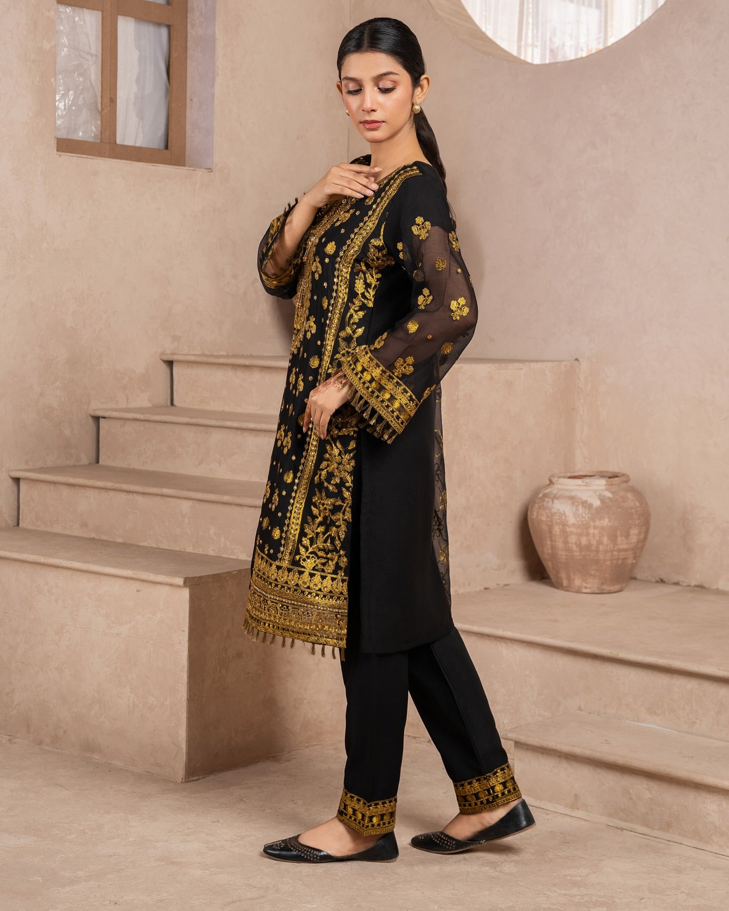 Elegant Pakistani formal outfit featuring a full embroidered chiffon shirt and dupatta with intricate zardozi work, paired with embroidered Malai fabric trousers. Available in small, medium, and large sizes from Riwaj Fashions.