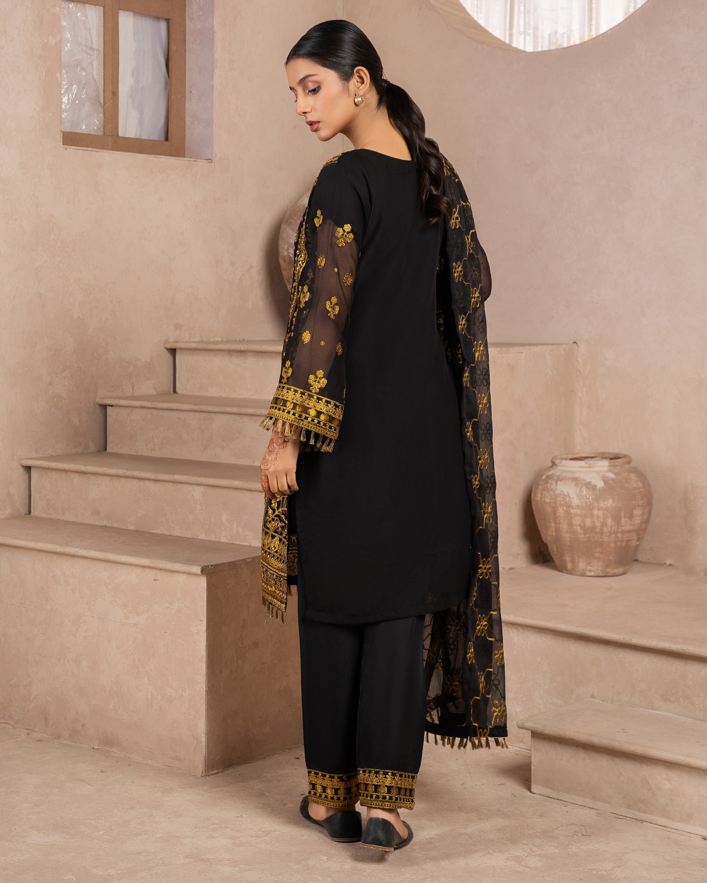 Elegant Pakistani formal outfit featuring a full embroidered chiffon shirt and dupatta with intricate zardozi work, paired with embroidered Malai fabric trousers. Available in small, medium, and large sizes from Riwaj Fashions.