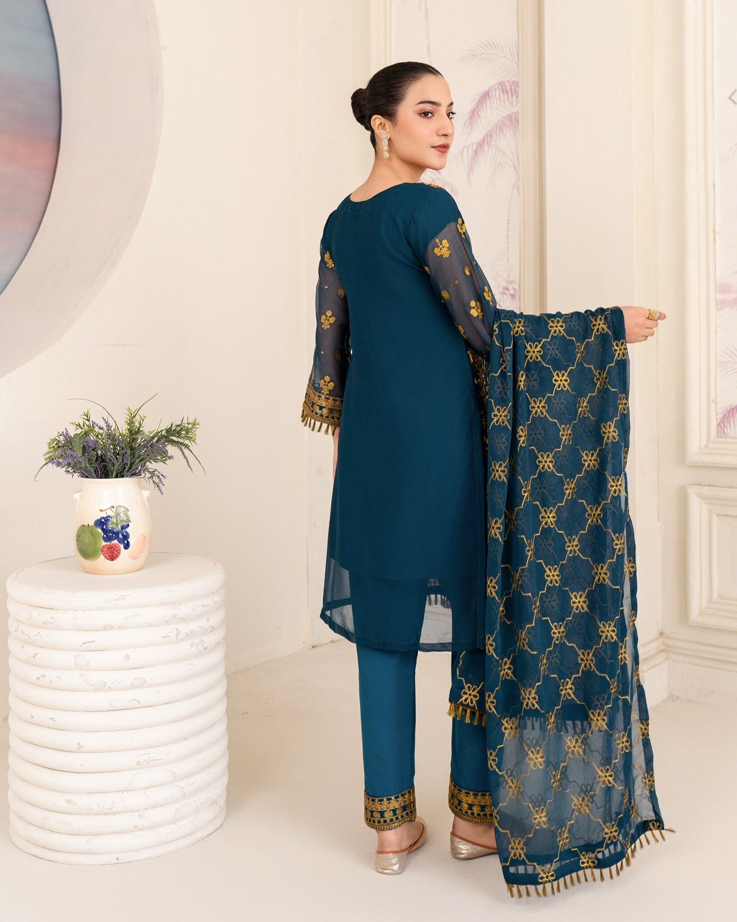 Elegant Pakistani formal outfit featuring a full embroidered chiffon shirt and dupatta with intricate zardozi work, paired with embroidered Malai fabric trousers. Available in small, medium, and large sizes from Riwaj Fashions.