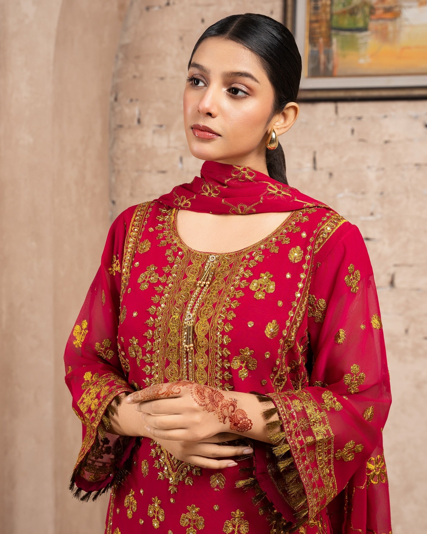 Elegant Pakistani formal outfit featuring a full embroidered chiffon shirt and dupatta with intricate zardozi work, paired with embroidered Malai fabric trousers. Available in small, medium, and large sizes from Riwaj Fashions.