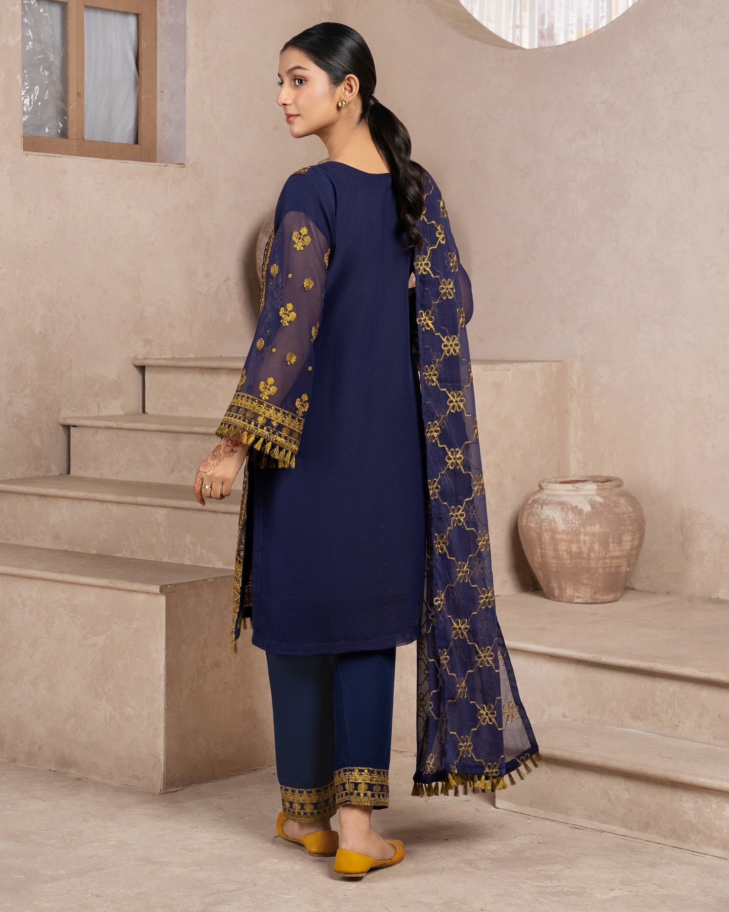 Elegant Pakistani formal outfit featuring a full embroidered chiffon shirt and dupatta with intricate zardozi work, paired with embroidered Malai fabric trousers. Available in small, medium, and large sizes from Riwaj Fashions.