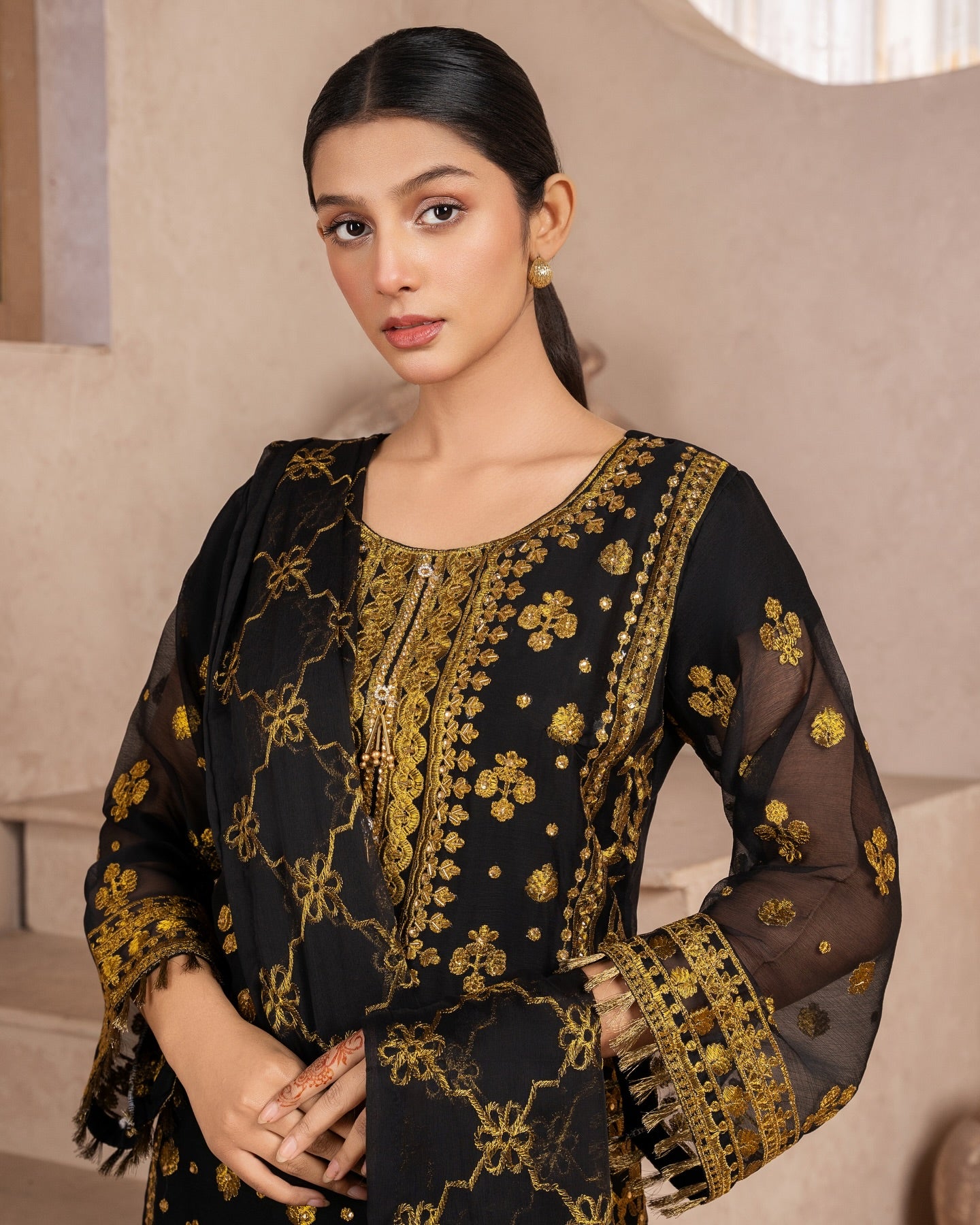 Elegant Pakistani formal outfit featuring a full embroidered chiffon shirt and dupatta with intricate zardozi work, paired with embroidered Malai fabric trousers. Available in small, medium, and large sizes from Riwaj Fashions.